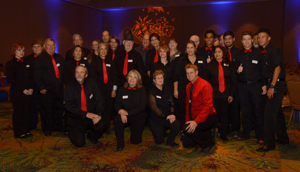 Group of casino dealers at Black Tie Casino Party Rental tables